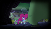 Spike grabs Pinkie Pie by the tail S5E21