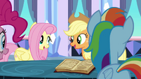 Fluttershy and Applejack singing along.