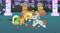 Applejack helps him to get up