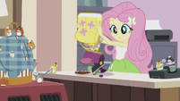 Fluttershy emptying the contents of her bag EG2