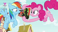 Pinkie showing Washouts flyer to Rainbow S8E20