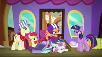 Scootaloo and Sweetie Belle in pile of luggage S8E6