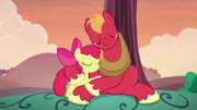 Apple Bloom and Big McIntosh hugging S5E17