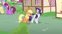 Applejack and Rarity walk through Ponyville S6E10