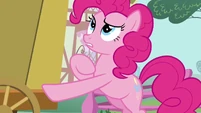Pinkie pushing a cart.