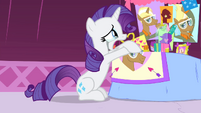 Rarity crying while looking at photos of Trenderhoof S4E13