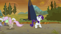 Rarity sees Sombrafied ponies charging at her S9E2
