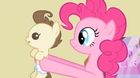 Pinkie Pie holding Pound Cake.