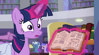 Spike tapping on Twilight's shoulder S9E5