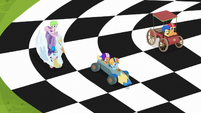 Crusaders' carts racing on a checkered flag S6E14