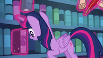 Twilight levitates another book off the shelf S6E19