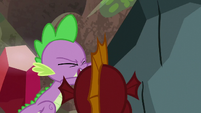 Spike pushing boulder off of Garble S6E5