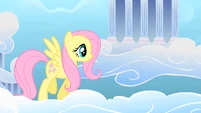 Fluttershy, happily walking on clouds.