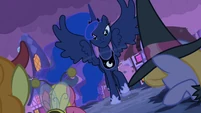 Princess Luna brandishes her wings.