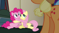 Pinkie and Fluttershy looking at Applejack S6E18