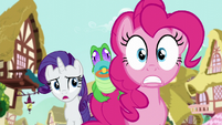 Pinkie with a nervous expression as Rarity asks her what she's talking about S5E19