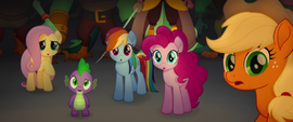 Ponies and Spike look at the glowing water MLPTM