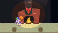 Spike storytelling to the left of the fireplace S2E11