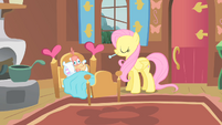 Fluttershy giving thermometer to Philomena S1E22