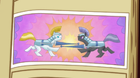 A picture of two ponies jousting.