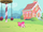 Pinkie Pie rolling around in the school playground S1E15.png