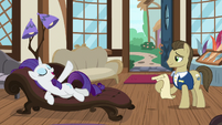 Rarity lying on a chaise in Davenport's store S7E19