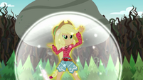 Applejack ponies up as she lifts a large rock EG4