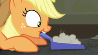 Applejack with a dustpan of dust S6E9