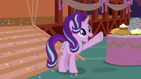 Starlight Glimmer waves to friends on the hill S8E3