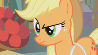 Applejack looks down at Apple Bloom S1E12