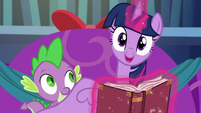 Spike closing Twilight's wing delicately is very considerate here!