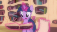 Twilight skimming pages S3E13