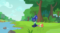 Luna resting her hooves by a river S9E13
