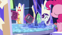 Books float past Applejack, Rarity, and Pinkie S7E25