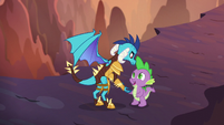 Princess Ember carries Spike to safety S6E5