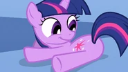 Twilight looking at her cutie mark S1E23