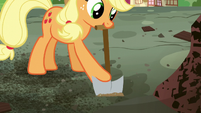 Applejack digging near the library ruins S5E03