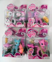 Blossomforth, Cupcake, Dewdrop Dazzle and Lulu Luck toys