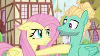 Fluttershy poking Zephyr with her hoof S6E11