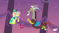 Fluttershy slaps flower out of Discord's paw S5E7