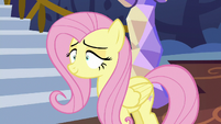 Fluttershy standing still in the castle foyer S6E21