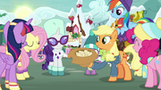 Mane Six gathered around the hat MLPBGE