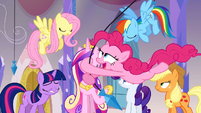 Pinkie Pie swinging by the main ponies and Cadance.