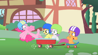 Pinkie Pie about to fall off the wagon S1E23