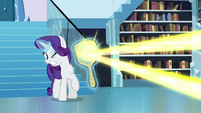 Rarity's mirror deflects the magic beam S6E2