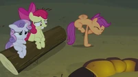 Scootaloo standing on one hoof.