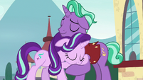 Starlight Glimmer and Firelight hugging S8E8