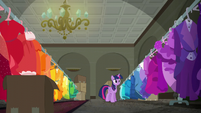 Twilight organizes Rarity's dresses by color S6E9