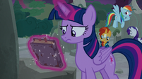 Twilight picks up Star Swirl the Bearded's journal S7E25