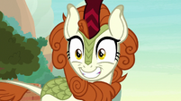 Autumn Blaze grinning wide at Applejack S8E23